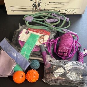 Home exercise bundle— AB wheel, two jump ropes, two bands, ankle weights